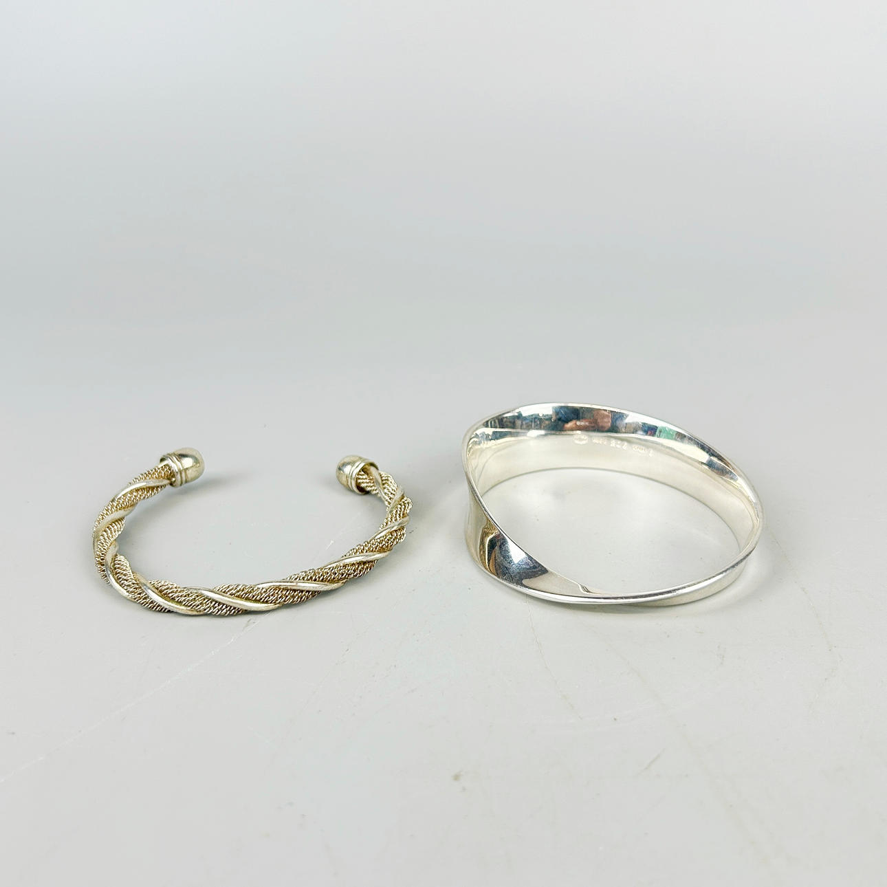 TWO SILVER BANGLES