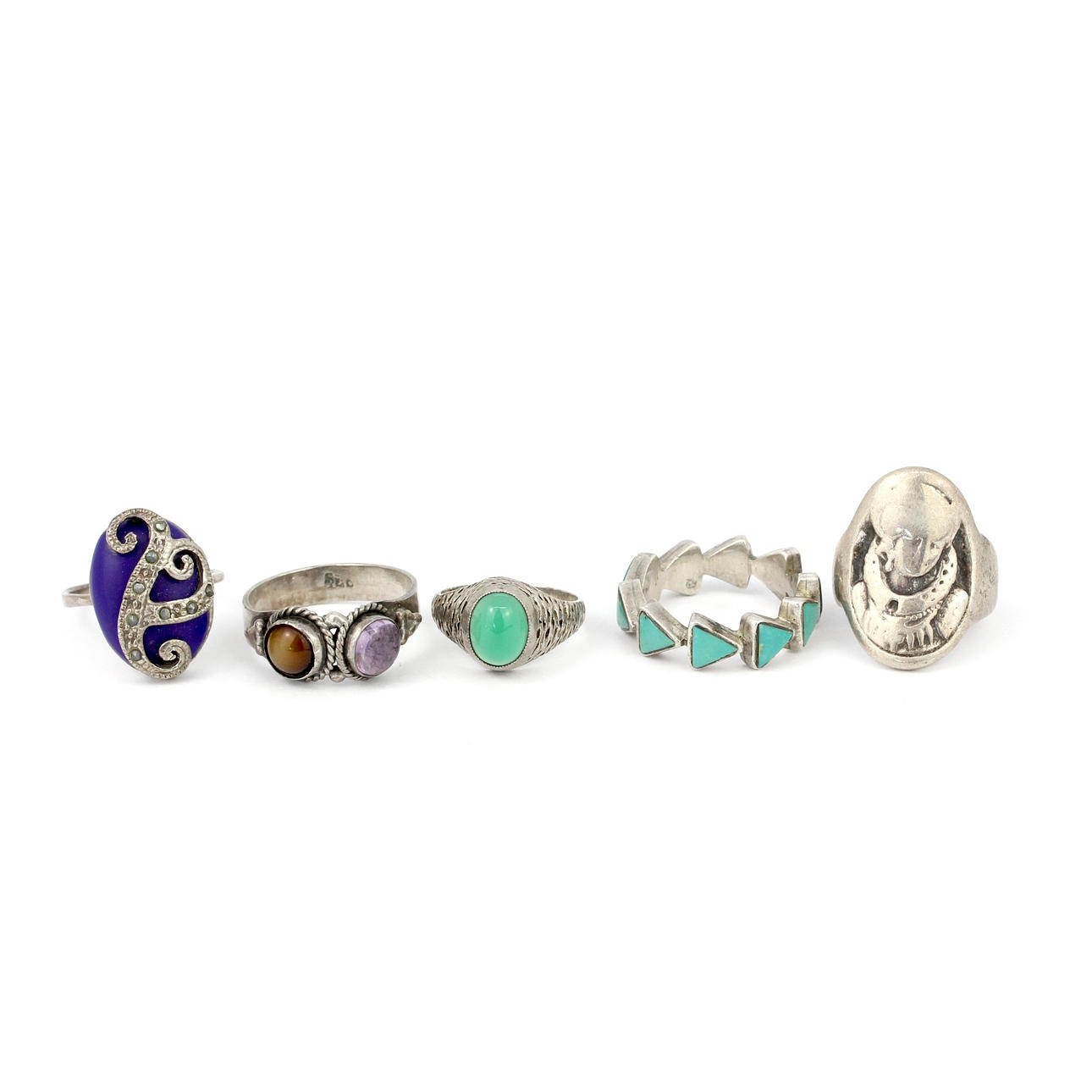 FIVE SILVER STONE SET RINGS